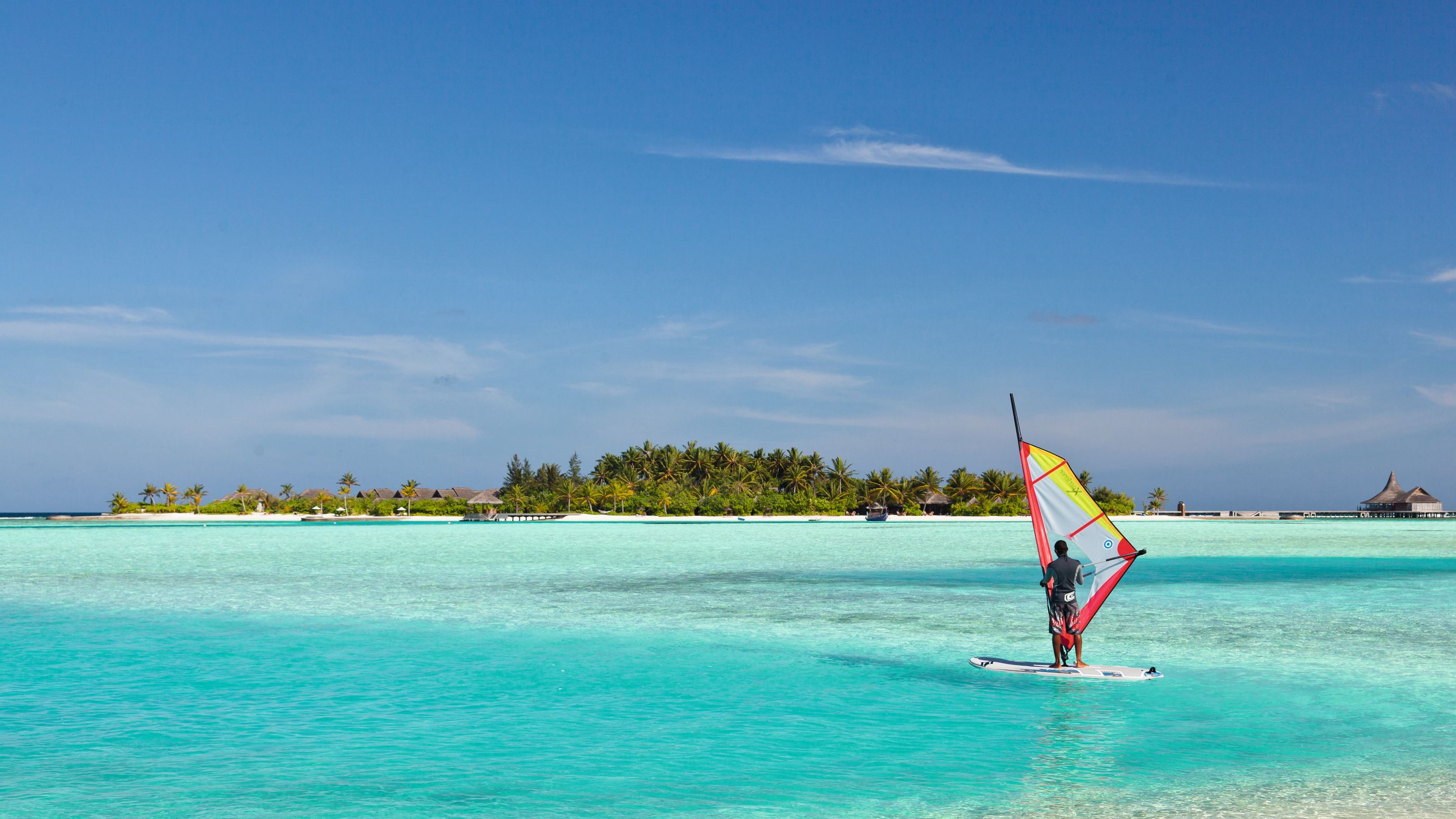 A windsurfer at Naladhu, Maldives