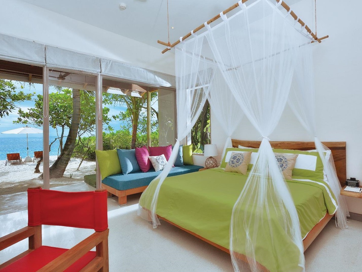 Interior of deluxe beach villa at Oblu By Atmosphere at Helengeli Maldives