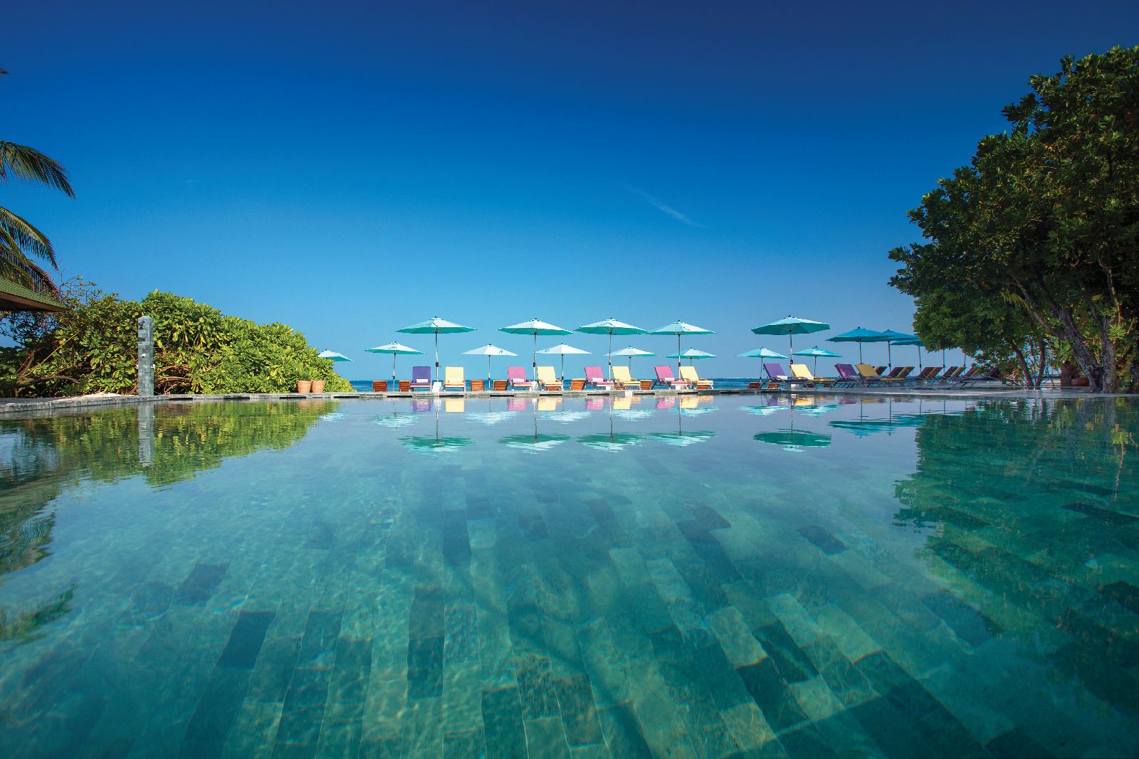 Swimming pool at Oblu By Atmosphere at Helengeli Maldives