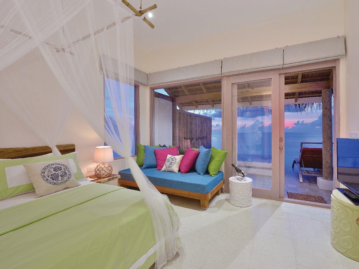 Interior of water villa at Oblu By Atmosphere at Helengeli Maldives