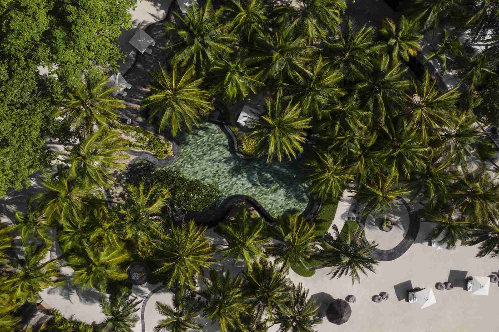 Aerial view of the family pool at the OneAndOnly Reethi Rah Maldives