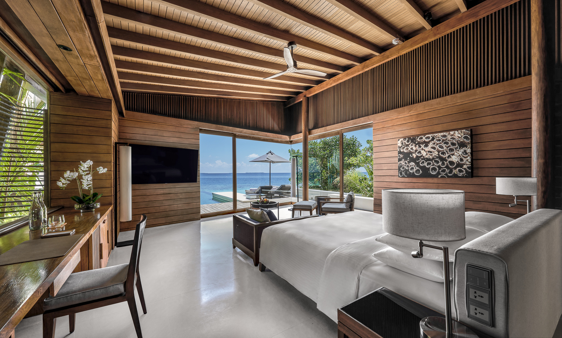 Beach pool villa bedroom at Park Hyatt Maldives Hadahaa