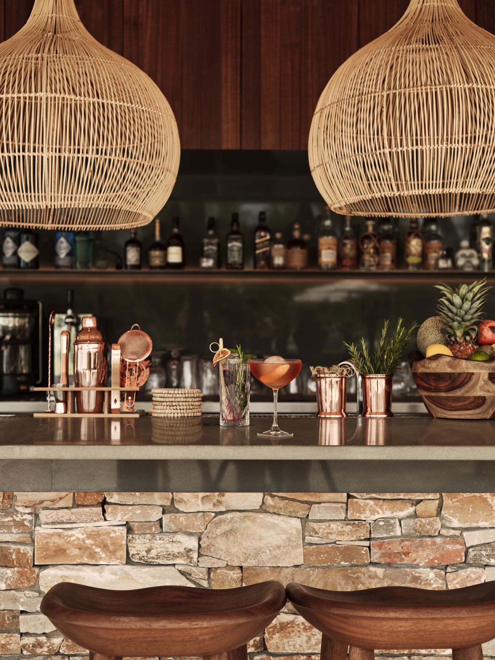 The bar with woven lampshades at Veli Bar at luxury resort Patina in the Maldives