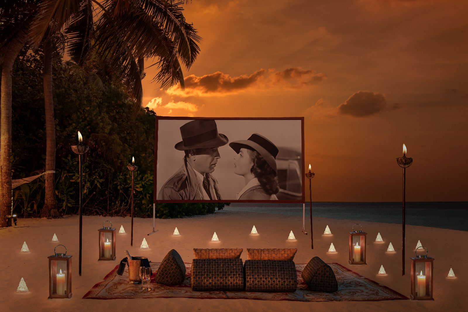 Private cinema on the beach at Raffles Maldives Meradhoo