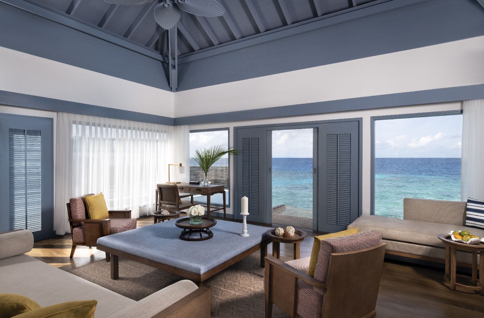 Living room of an Overwater Villa at Raffles Maldives Meradhoo