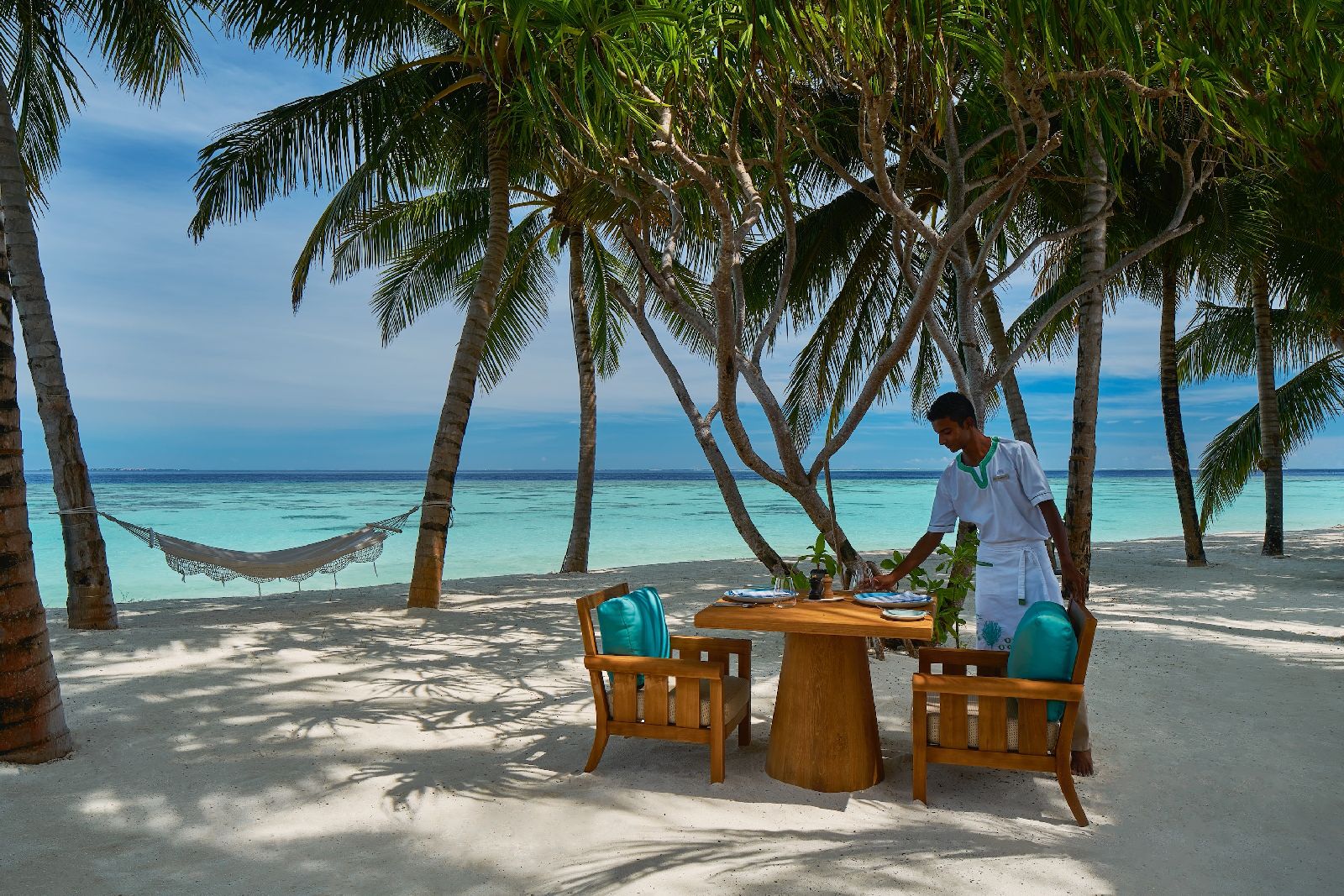 Beachfront dining at the Raffles Maldives Meradhoo