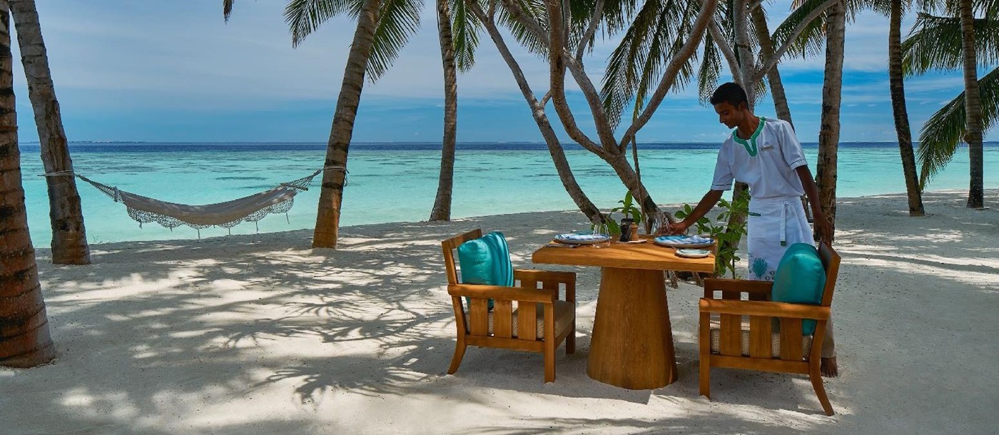 Beachfront dining at the Raffles Maldives Meradhoo
