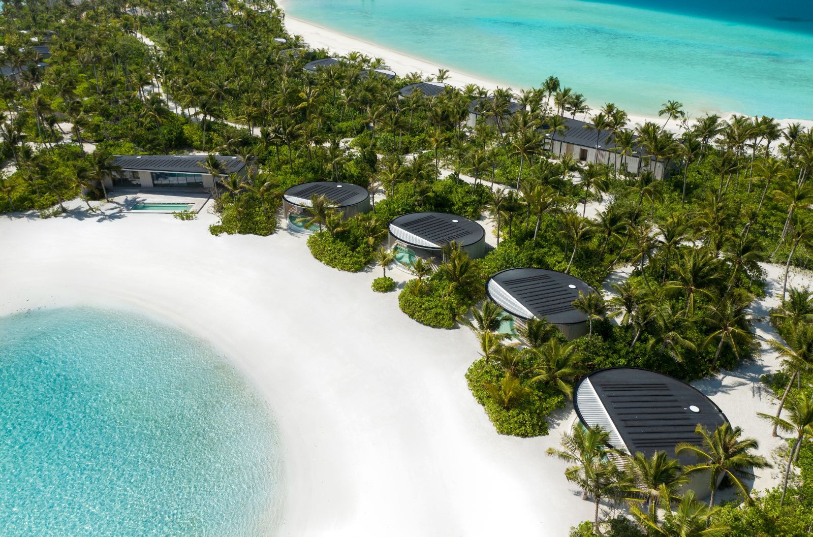 Aerial view of the beach front villas at Ritz Carlton Maldives