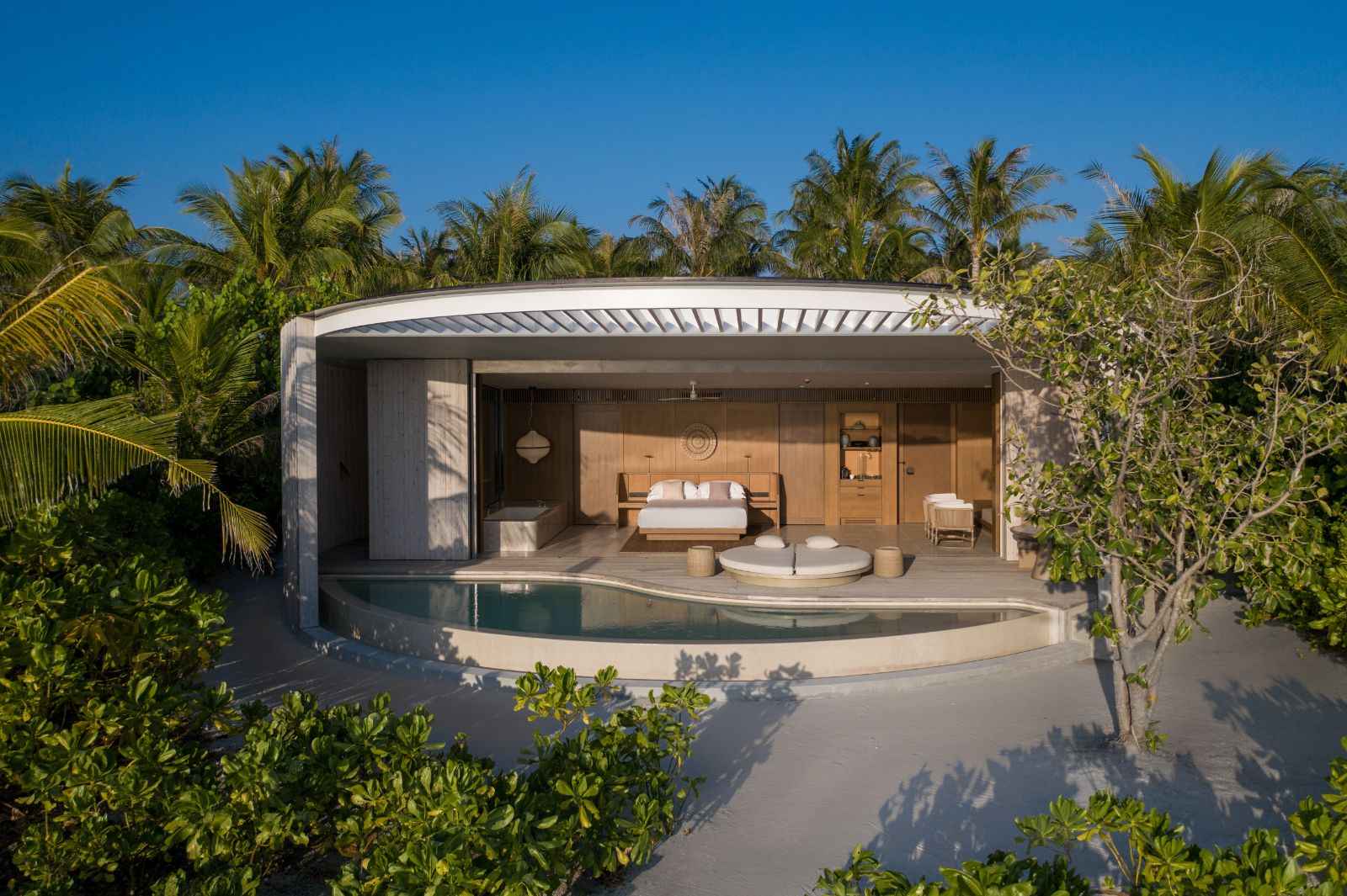 Exterior view of a beach front villa at Ritz Carlton Maldives