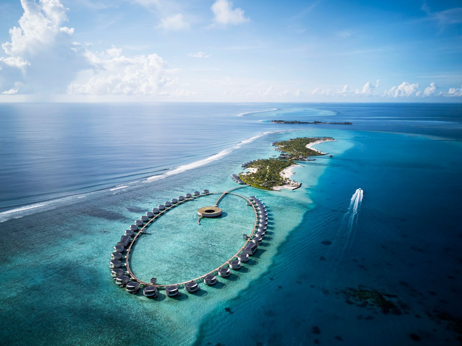 Aerial view of lagoon pool villas at Ritz Carlton Maldives