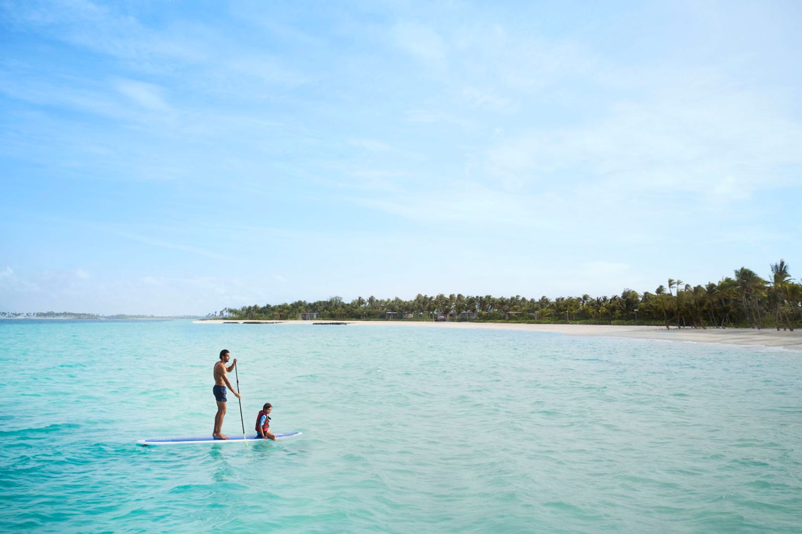 Paddle boarding on the grounds of Ritz Carlton Maldives