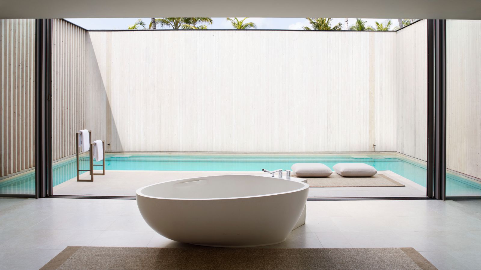 RC Estate master bedroom with private pool and bathtub at Ritz Carlton Maldives