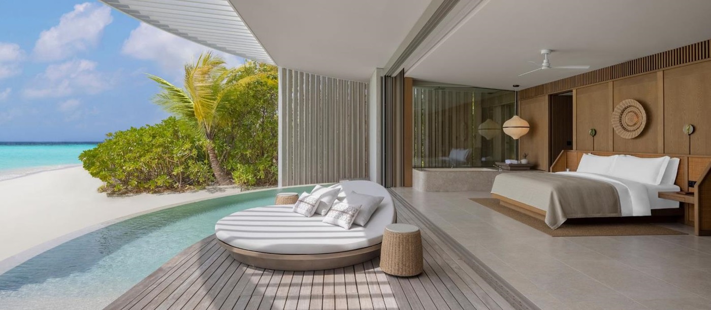 Sunset Beach Pool villa bedroom at Ritz Carlton Maldives