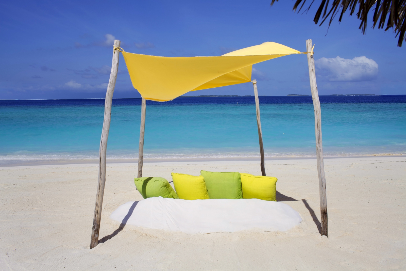 Private Beach Picnic on the white Sand Beach of luxury resort Six Senses Laamu in the Maldives