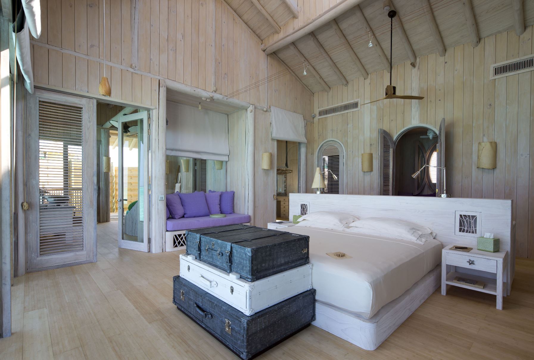 Double bedroom of an overwater villa at Soneva Jani, Maldives