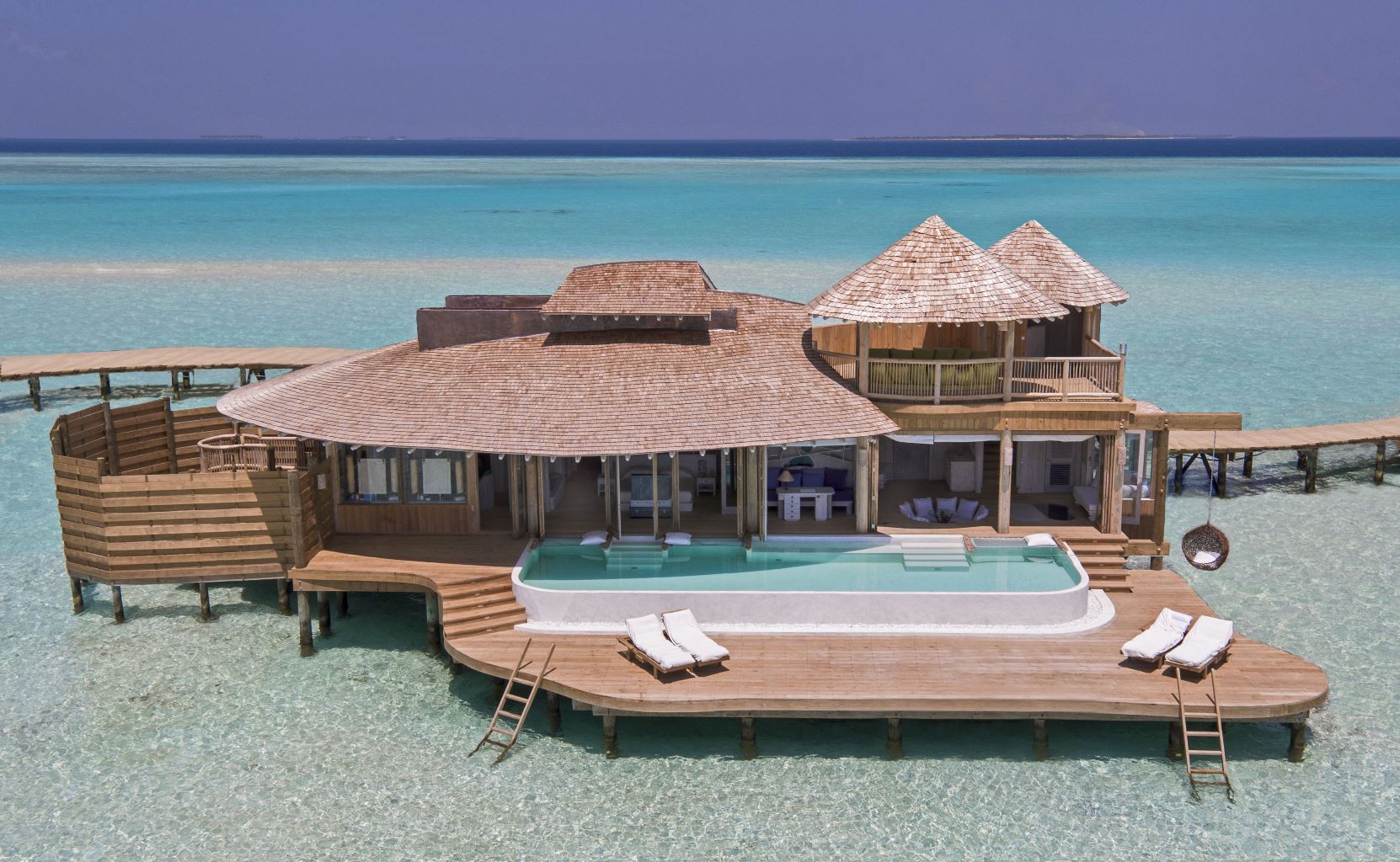exterior of an overwater villa with swimming pool at Soneva Jani, Maldives