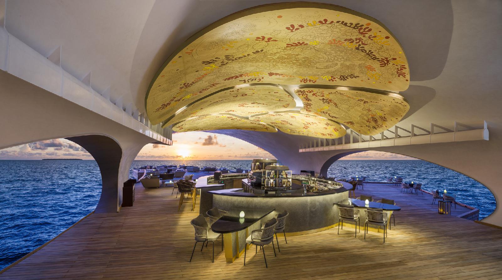 the wall mural of the whale bar in st regis maldives vommuli resort