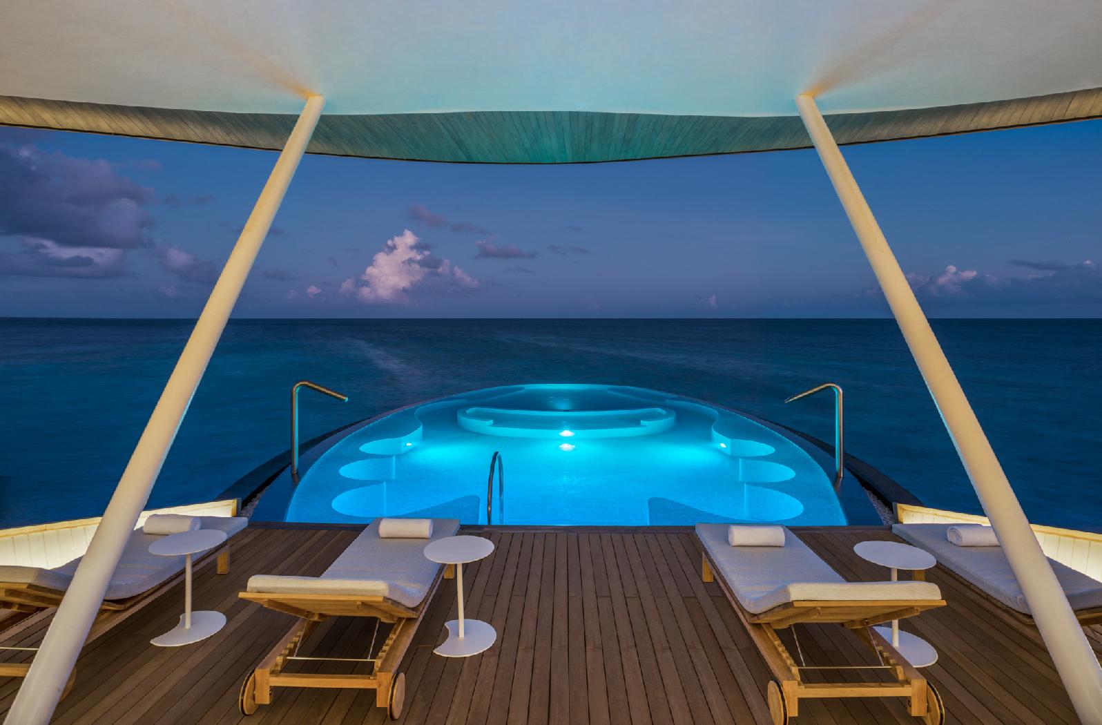 The blue hole swimming pool of the iridium spa at St Regis Vommuli, Maldives