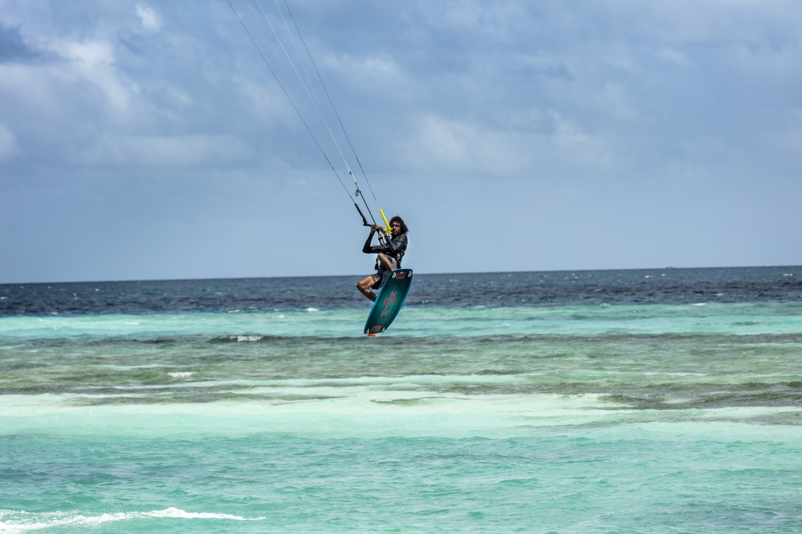 Man doing watersports at luxury resort Sun Siyam Olhuveli in the Maldives