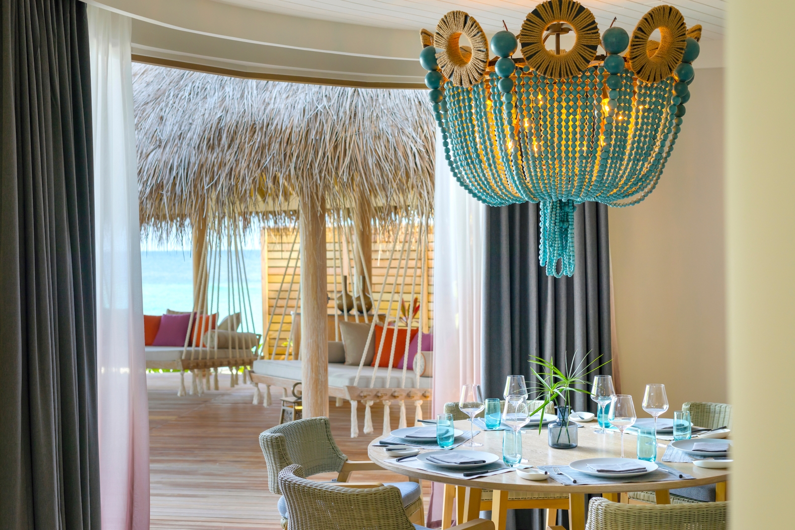 Dining room of a mansion at luxury resort The Nautilus in the Maldives
