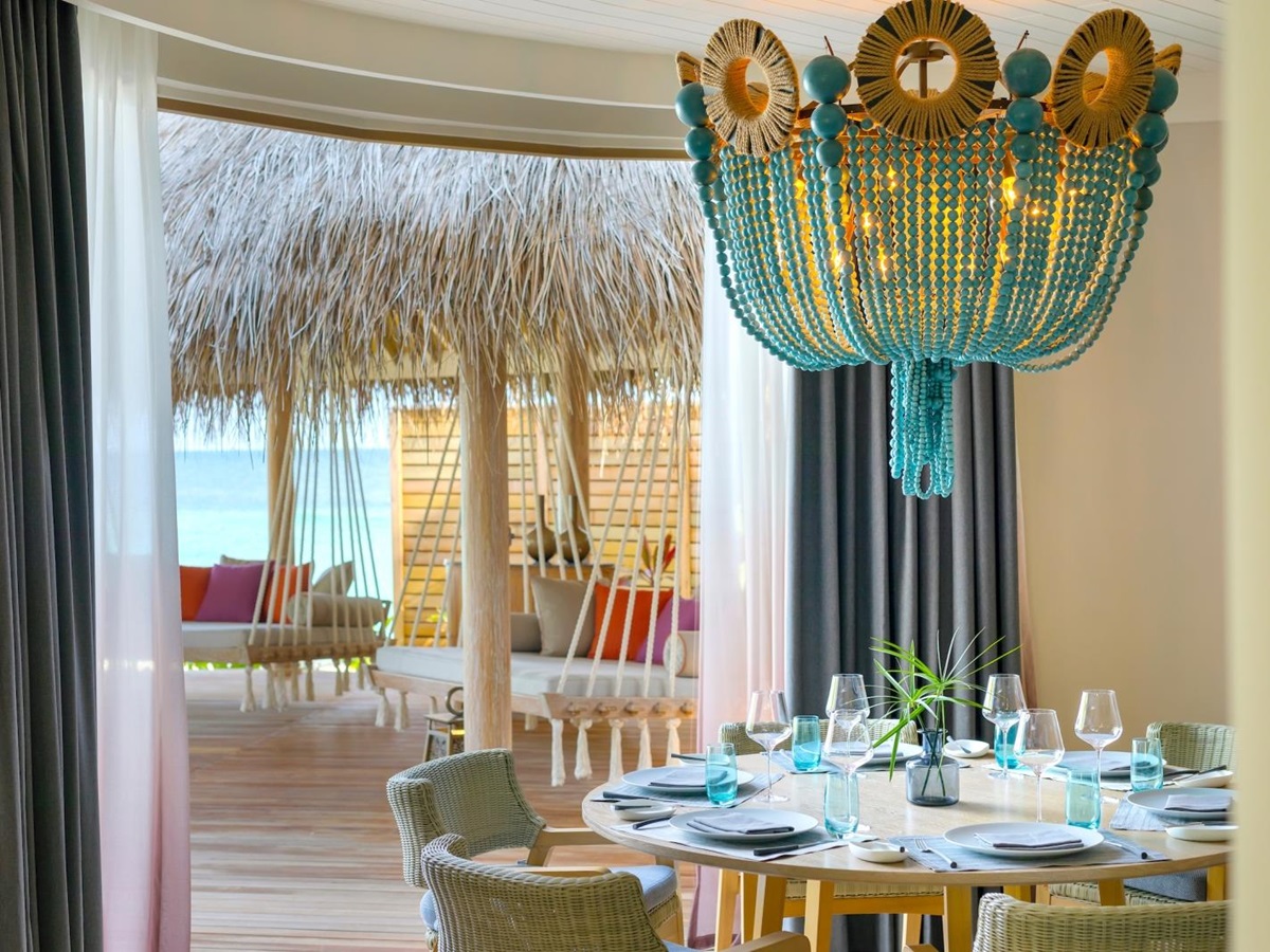 Dining room of a mansion at luxury resort The Nautilus in the Maldives