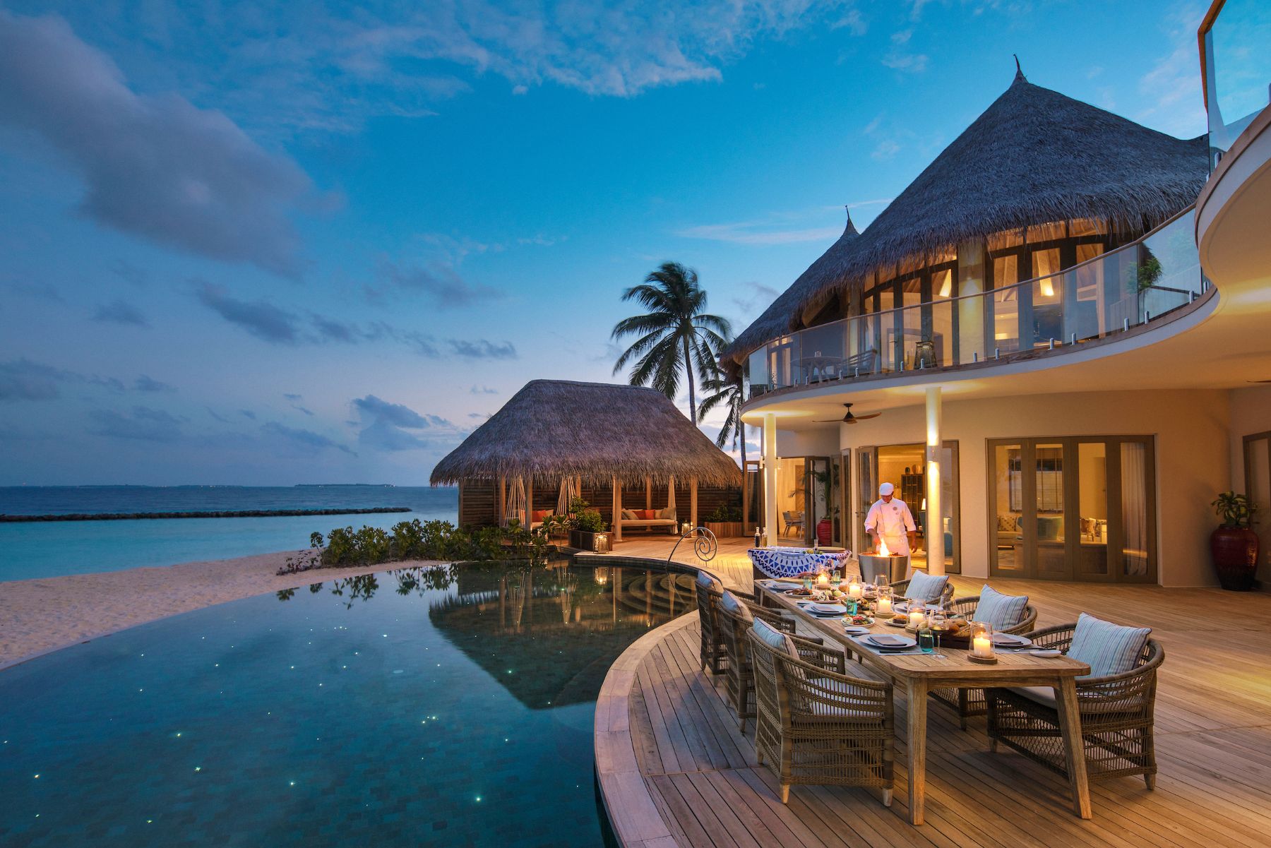 Dining on the pool deck at the Nautilus luxury private island resort in the Maldives