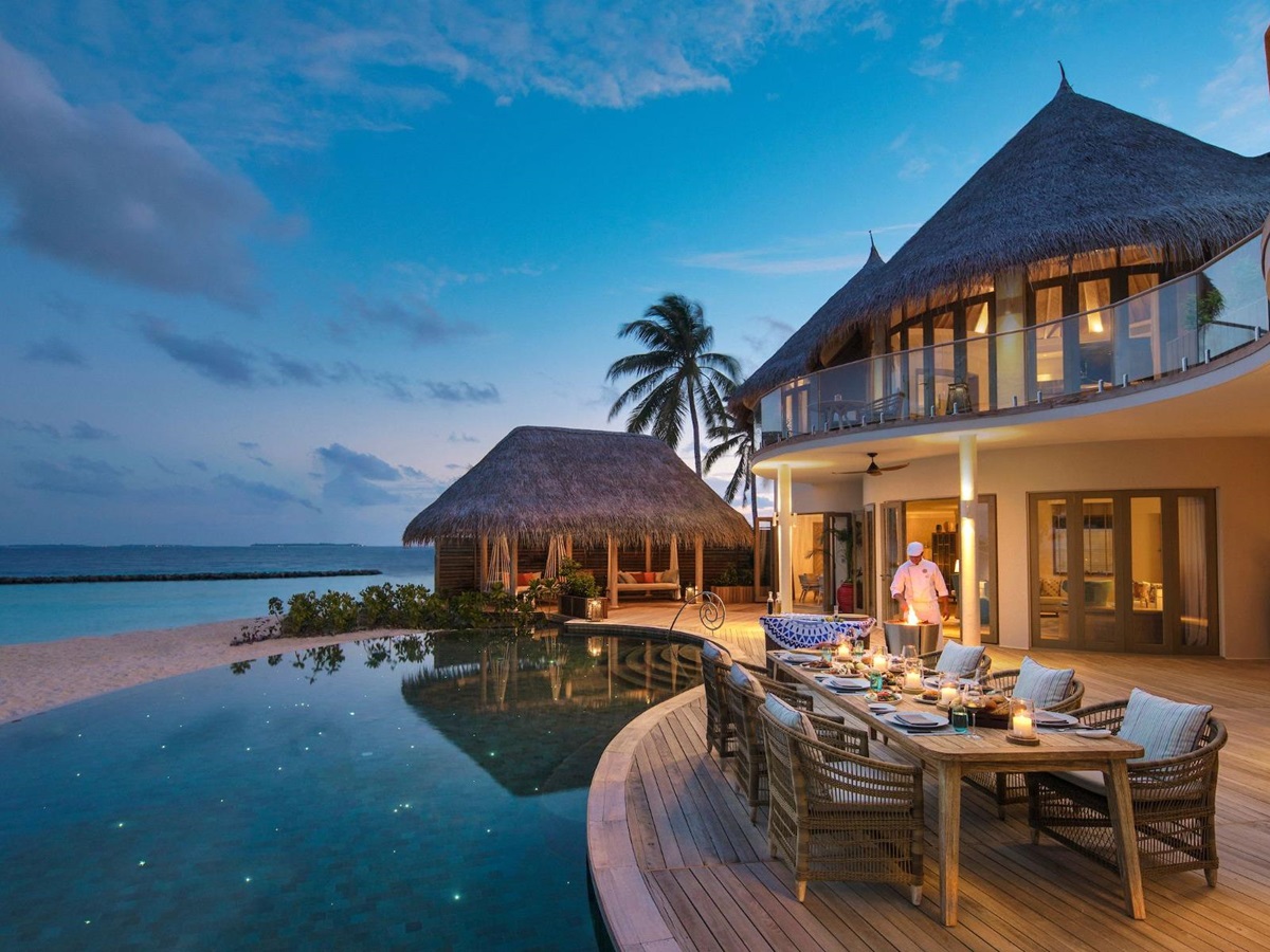 Dining on the pool deck at the Nautilus luxury private island resort in the Maldives