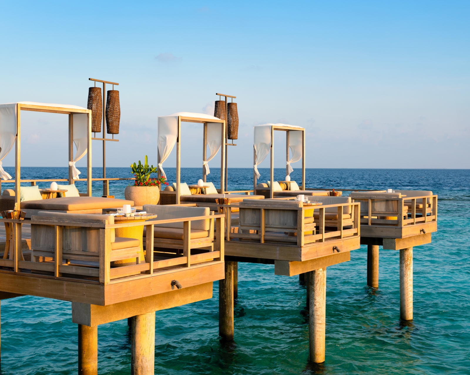 Over-water tables at the Lagoon Bar at luxury resort Vakkaru in the Maldives
