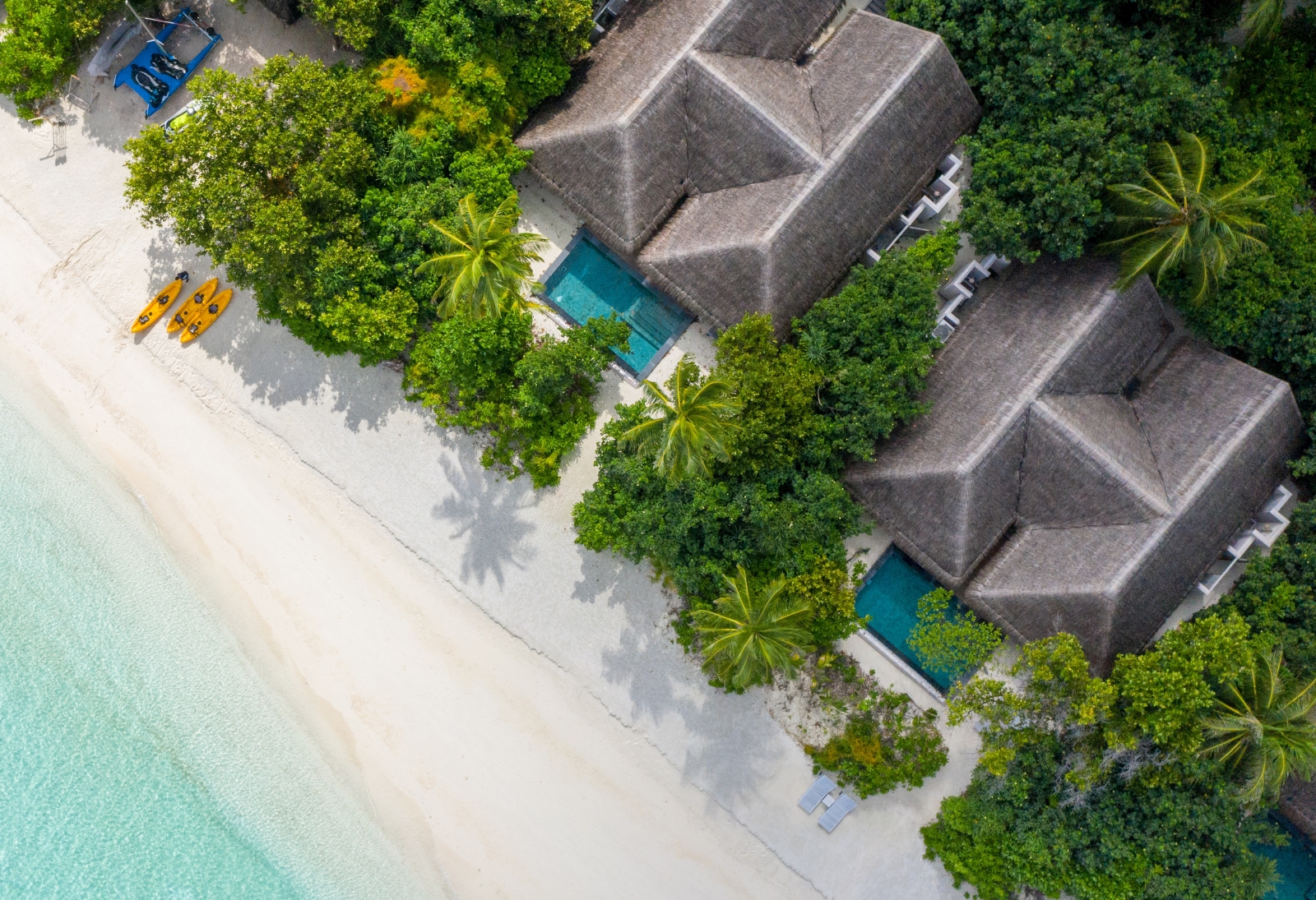 Aerial shot of two-bedroom beach pool villas at luxury resort Vakkaru in the Maldives