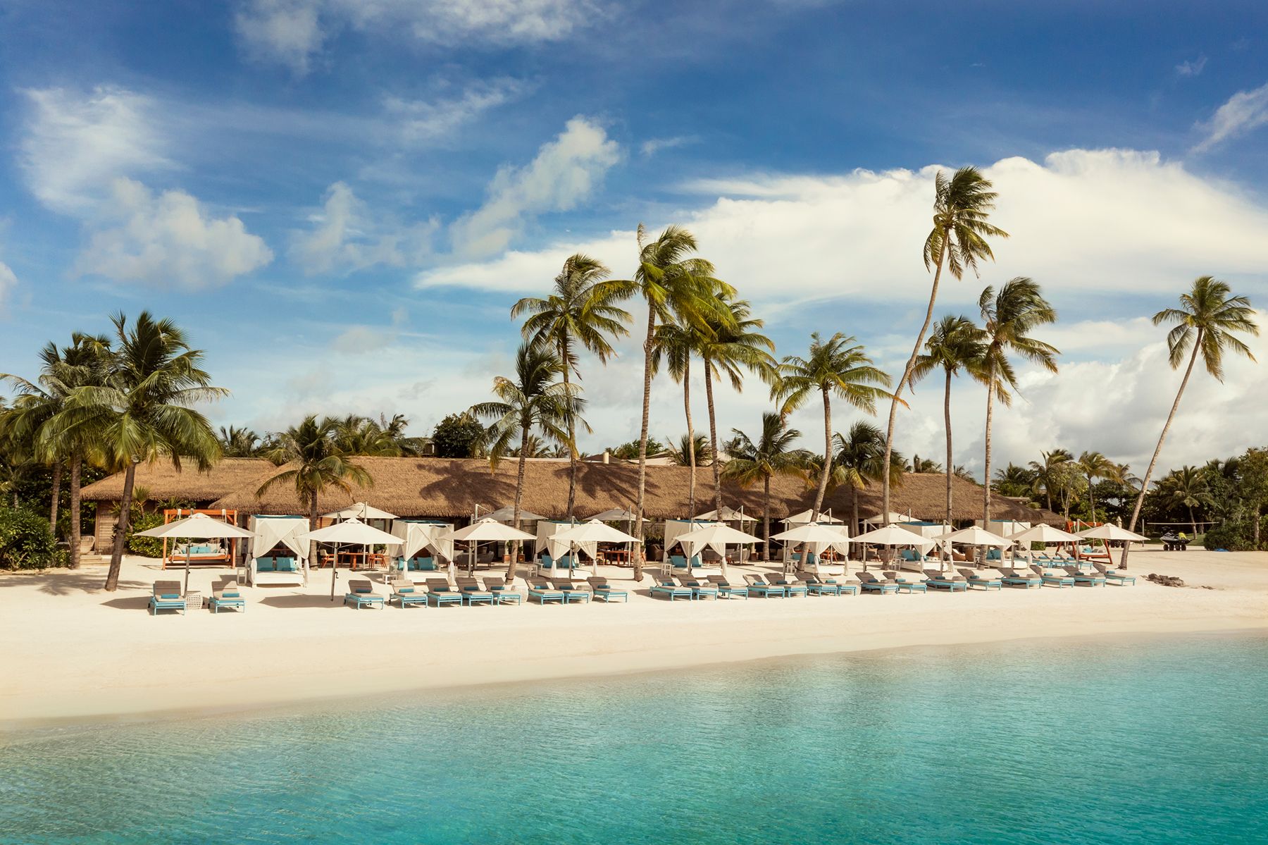 Beach loungers at Waldorf Astoria Maldives Ithaafushi