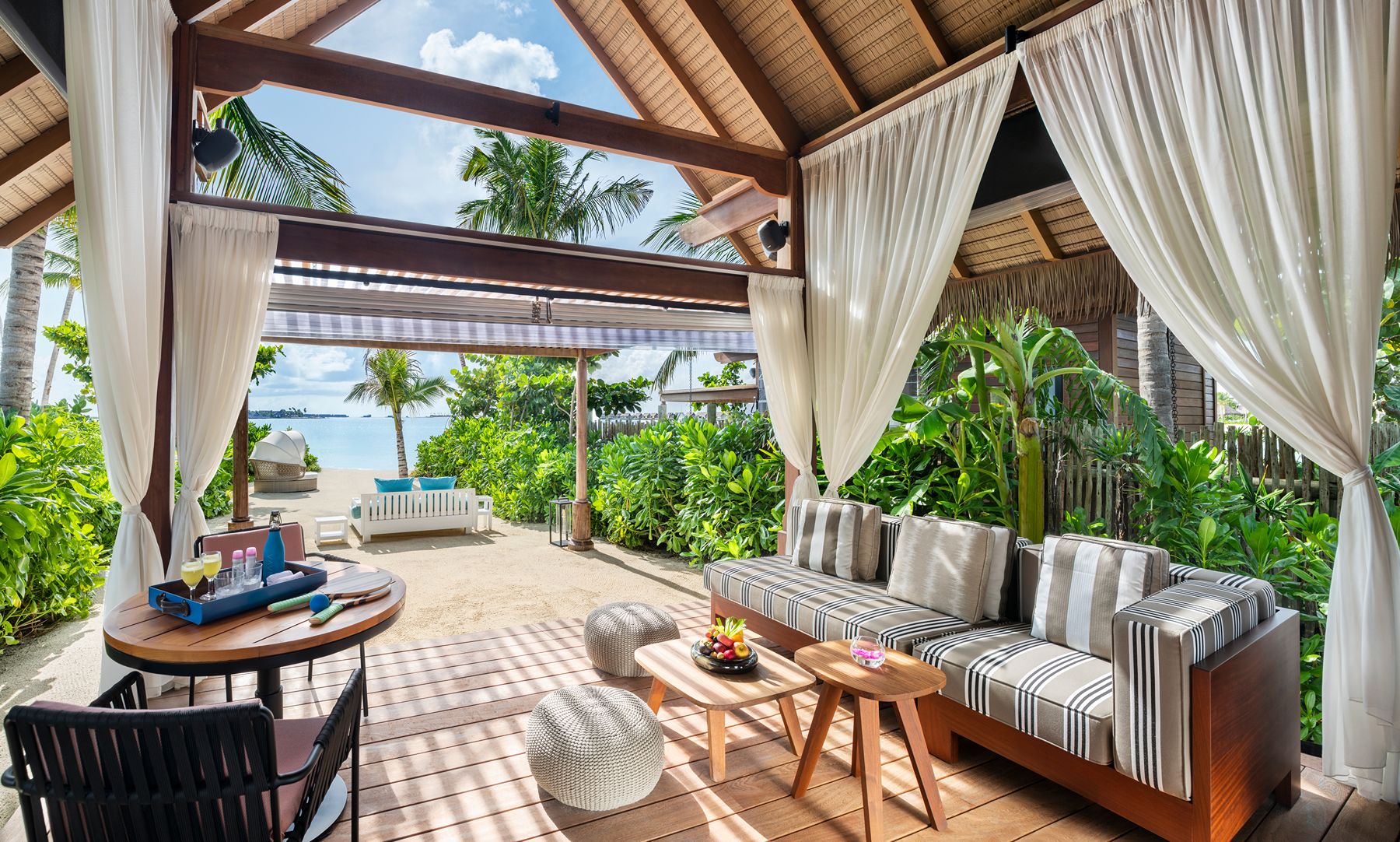 Outdoor terrace at Waldorf Astoria Maldives Ithaafushi