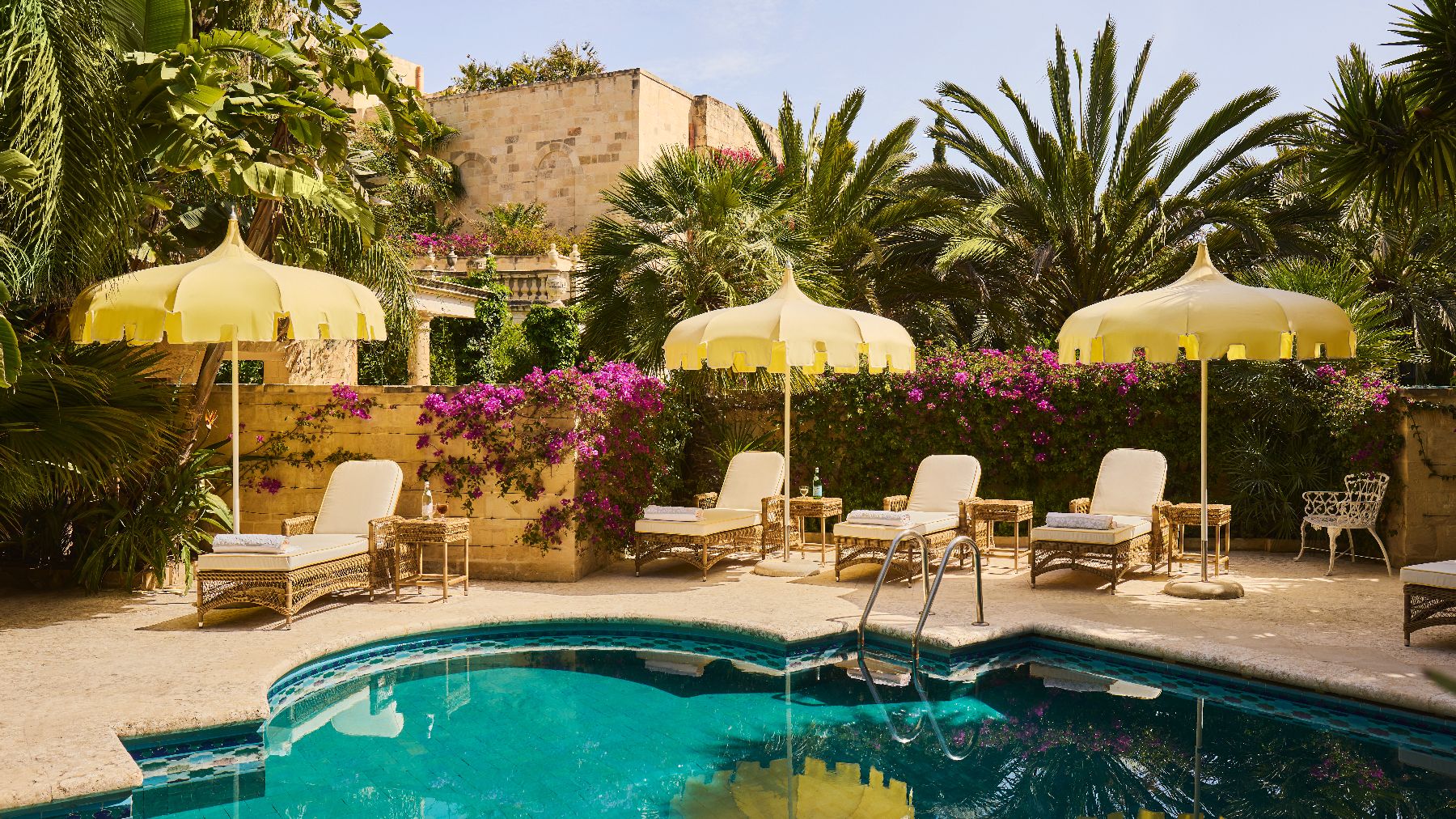 Swimming pool terrace and gardens at Casa Bonavita hotel in Attard Malta