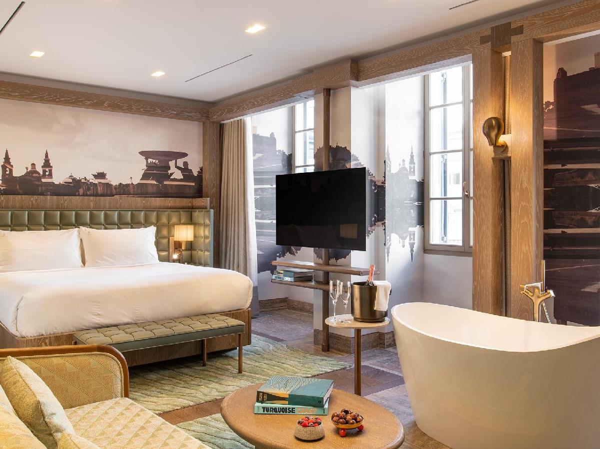 A Deluxe Junior Suite at Iniala Harbour House hotel in Valletta Malta