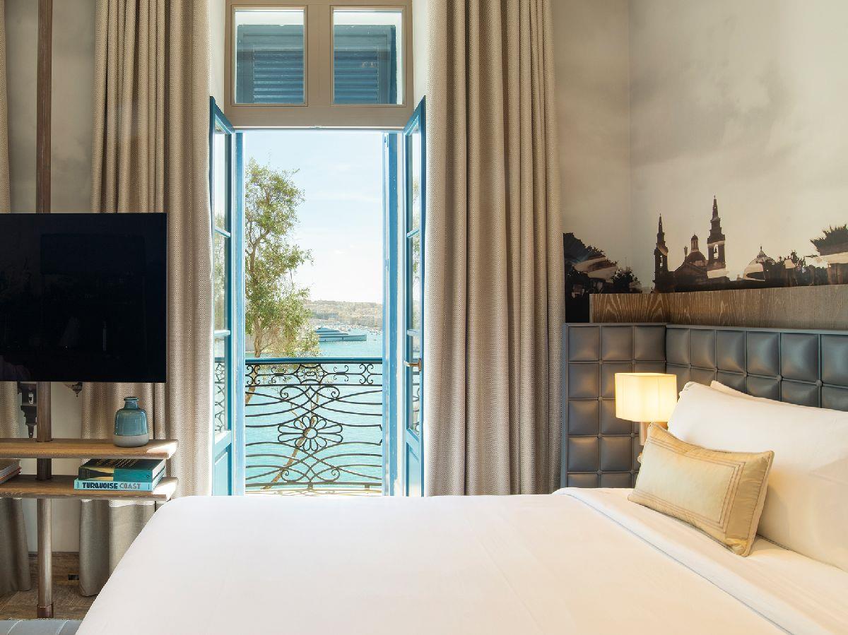 A Grand Junior Suite at Iniala Harbour House hotel in Valletta Malta