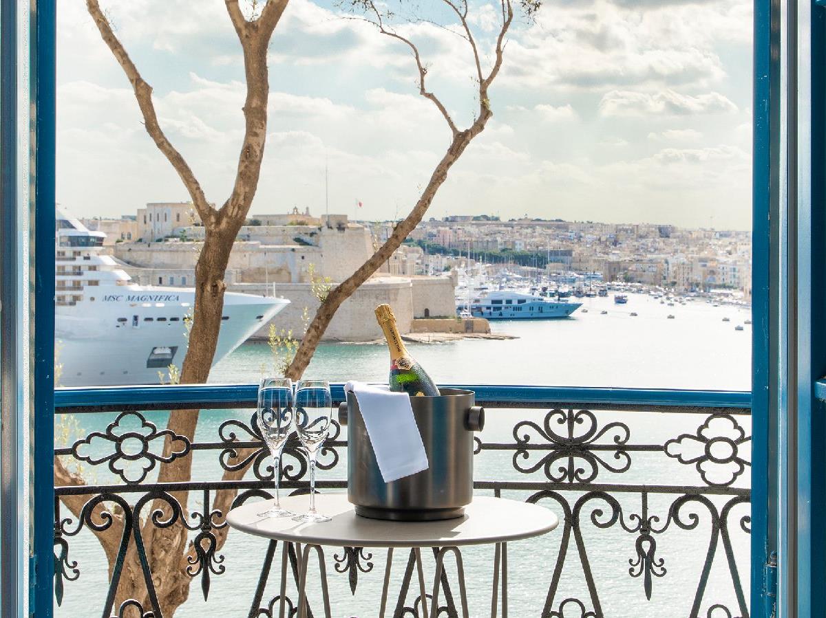 View from a Deluxe Seaview Suite at Iniala Harbour House hotel in Valletta Malta
