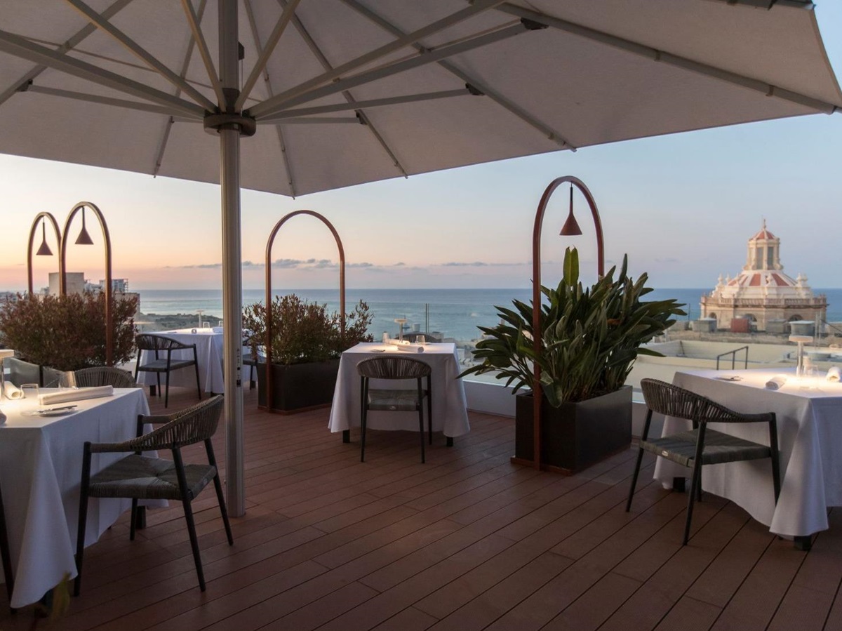 Rooftop terrace of the Over Grain cocktail lounge at the Rosselli AX Privilege Hotel in Valletta Malta