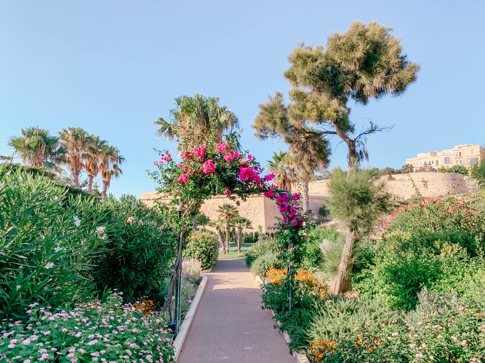 Flower filled gardens of The Phoenica Malta hotel in Valletta