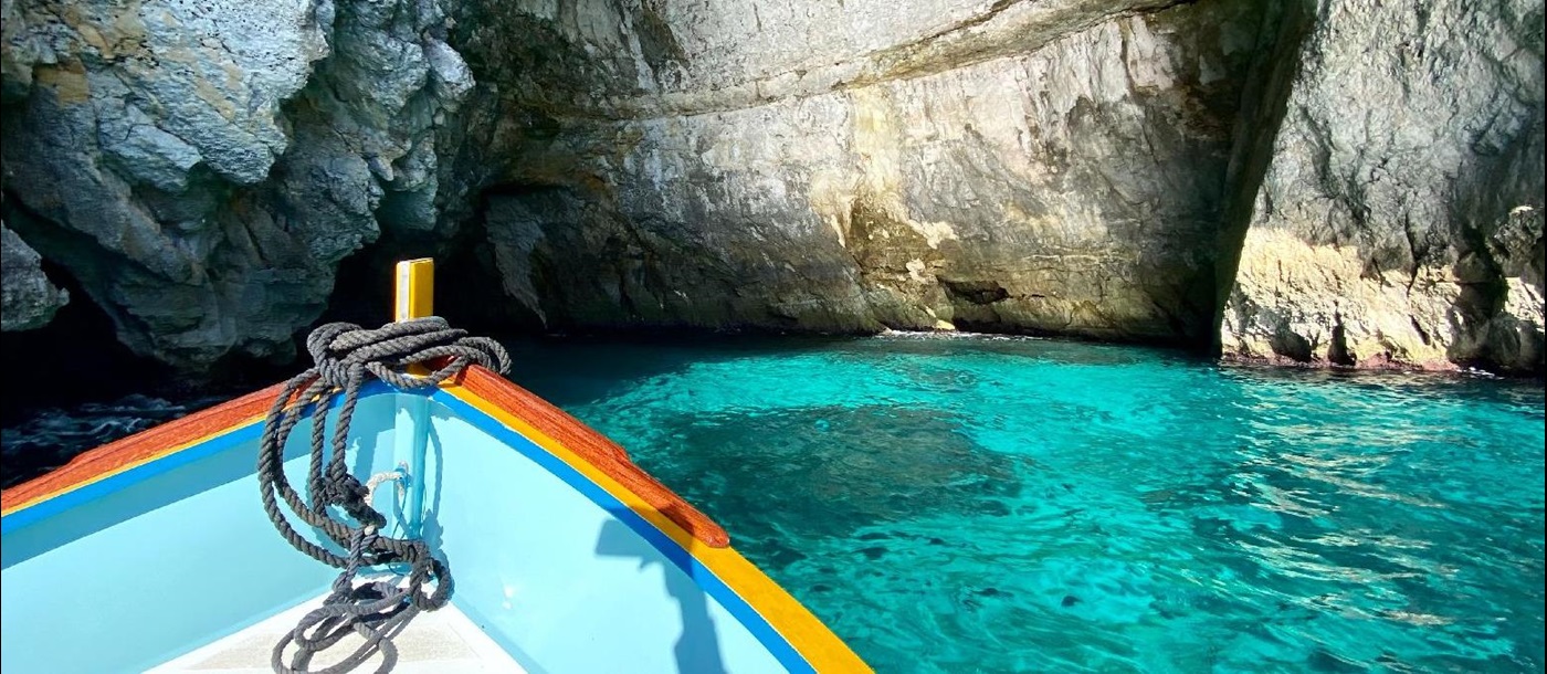Boat entering the Blue Grotto in Malta