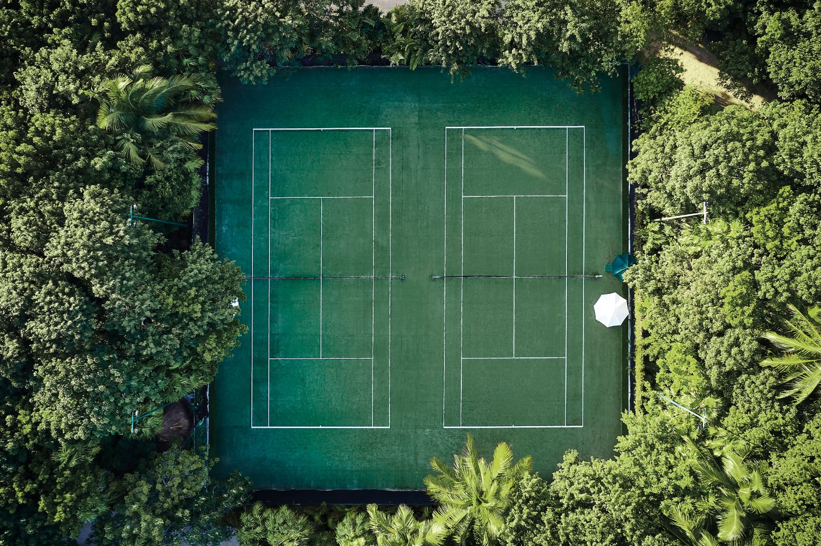 Aerial view of the tennis courts at Belmond Maroma in Mexico