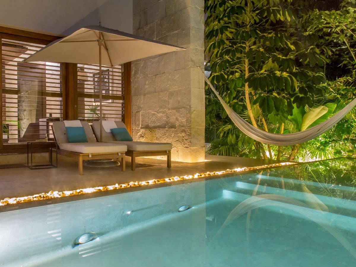 Poolside sunbeds at Chable Yucatan on The Yucatan Peninsula in Mexico