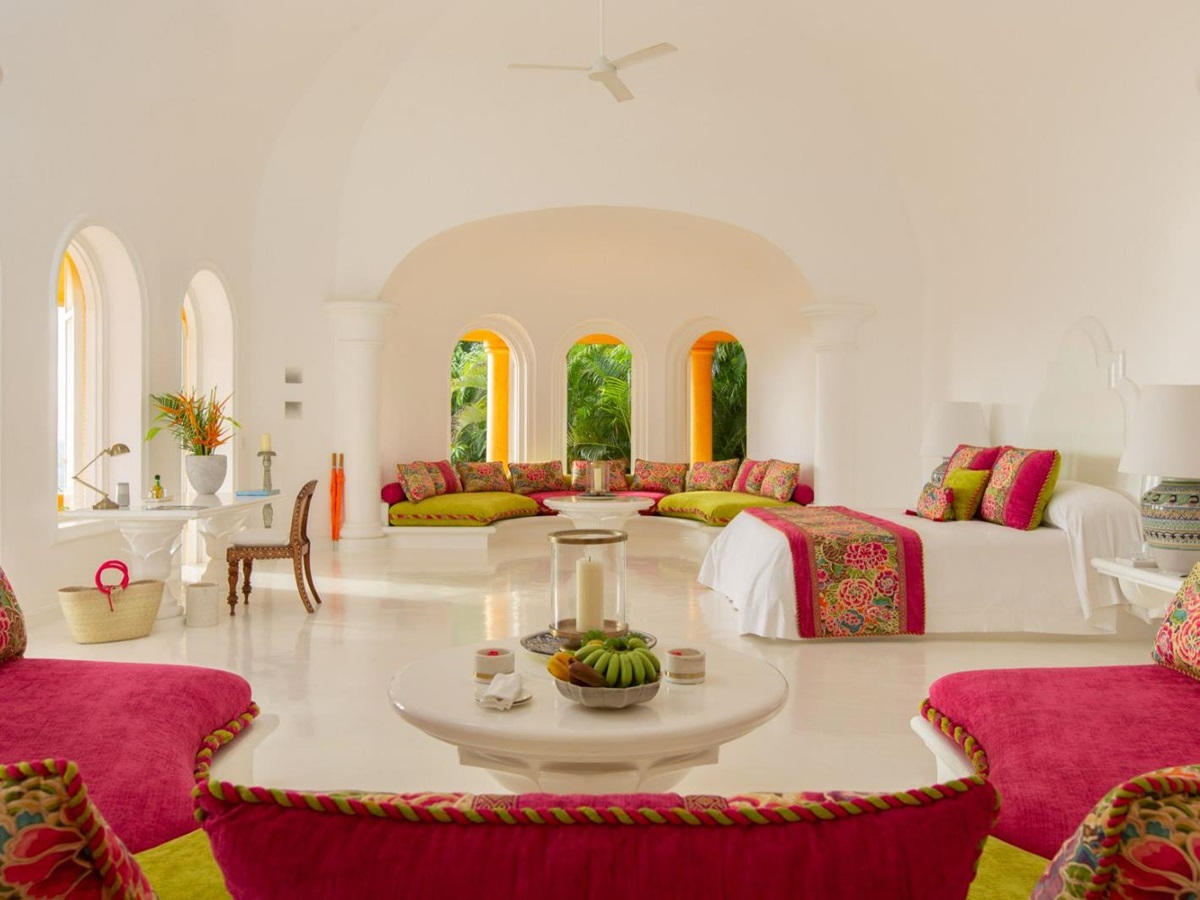Bungalow bedroom and living area at Cuixmala on Mexico's Pacific Coast