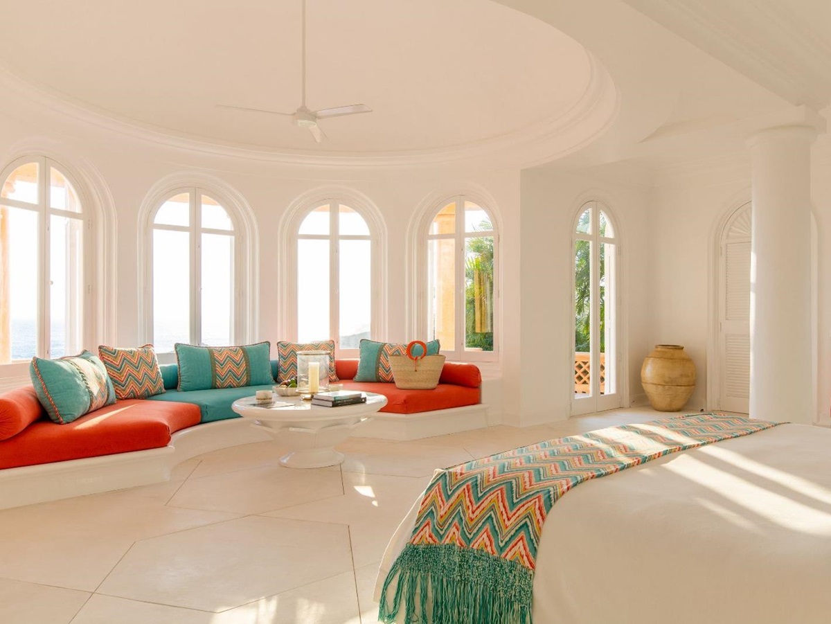 Bungalow bedroom and living area at Cuixmala on Mexico's Pacific Coast