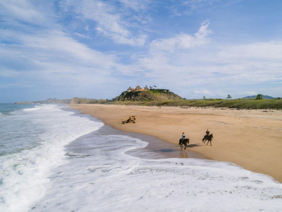 Riding along the beach from Cuixmala's stables on Mexico's Pacific coast