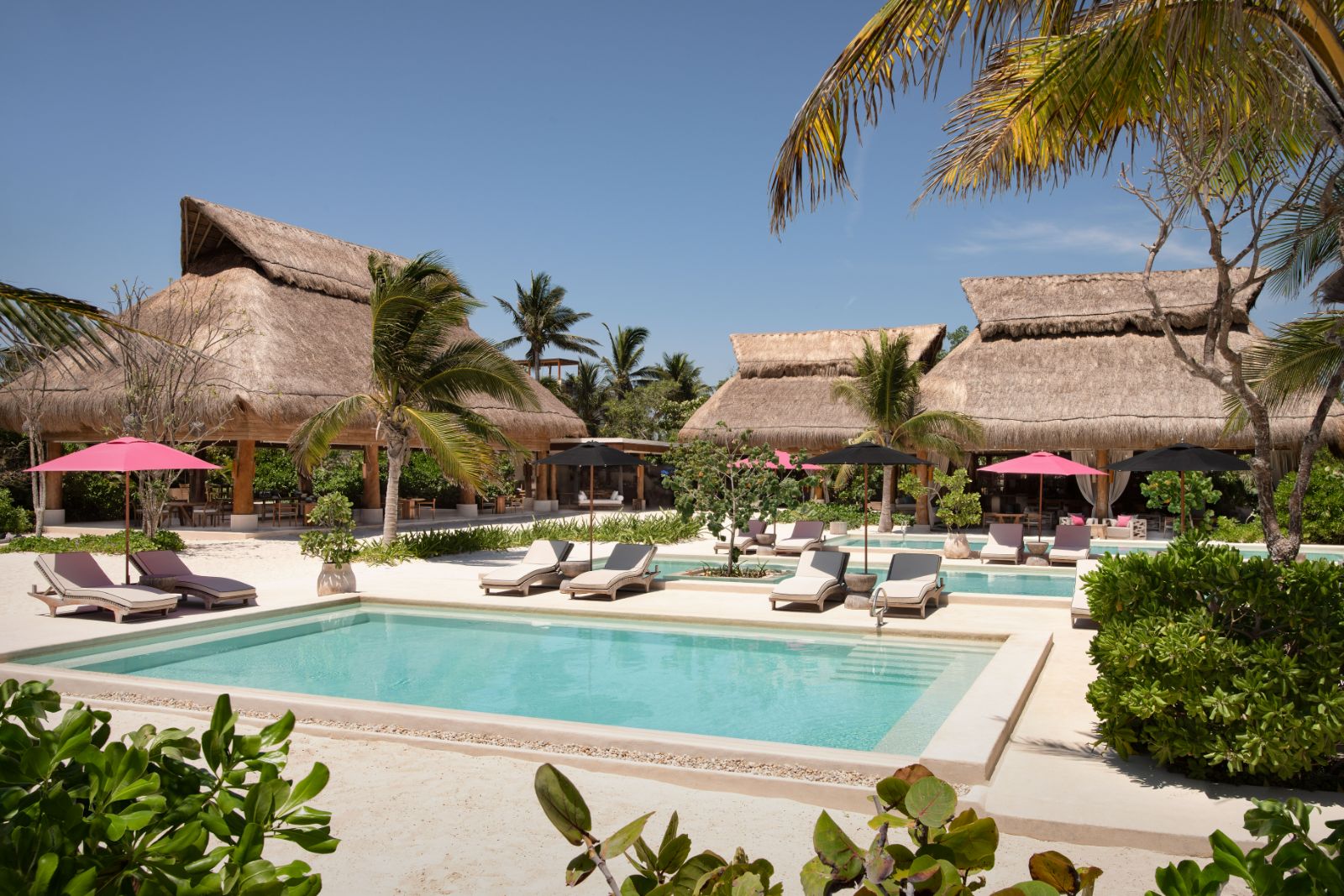 Pool at Aqui me Quedo beach club at Rosewood Mayakoba on the Riviera Maya in Mexico