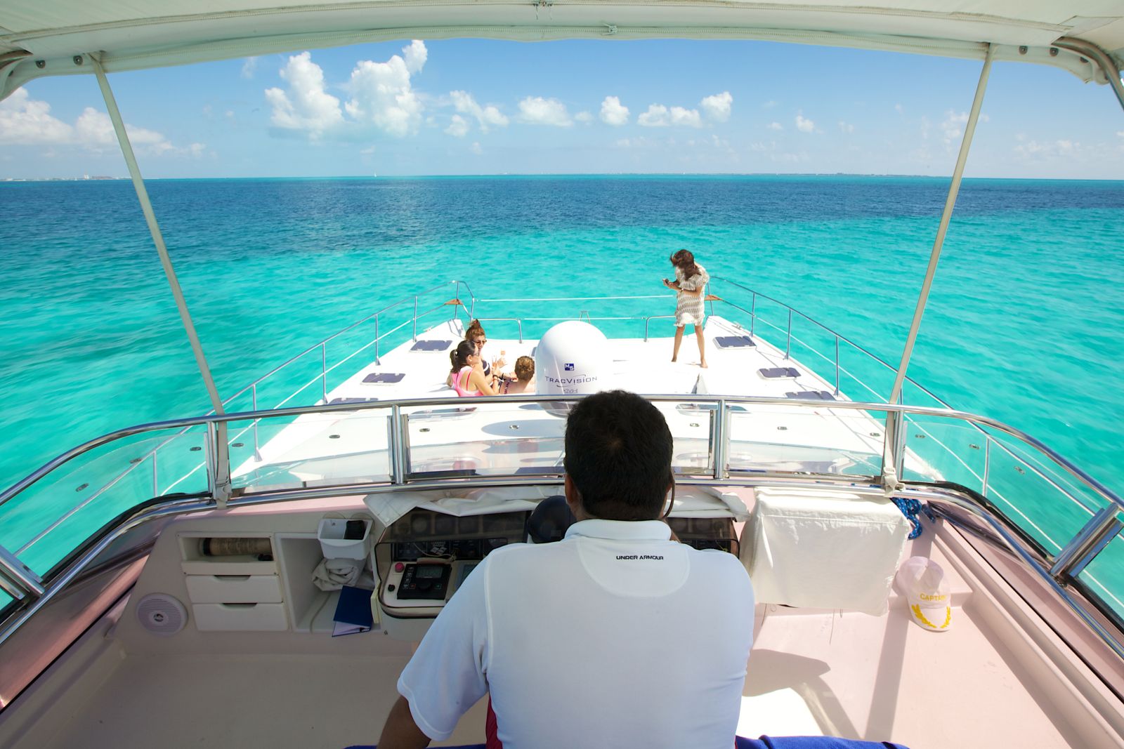 People sunbathing on a Catamaran near Andaz Mayakoba