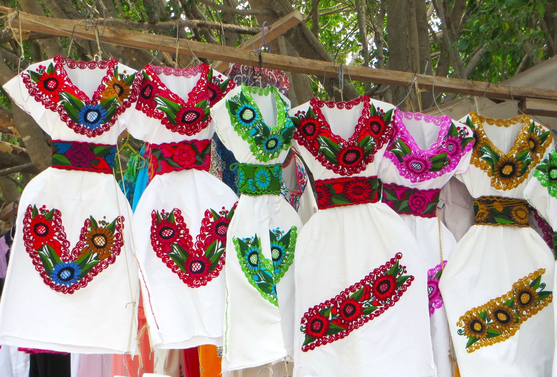 Colourful dresses on display at Oaxaca market