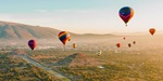 Hot air balloons over the Teotihuacan ruins in Mexico