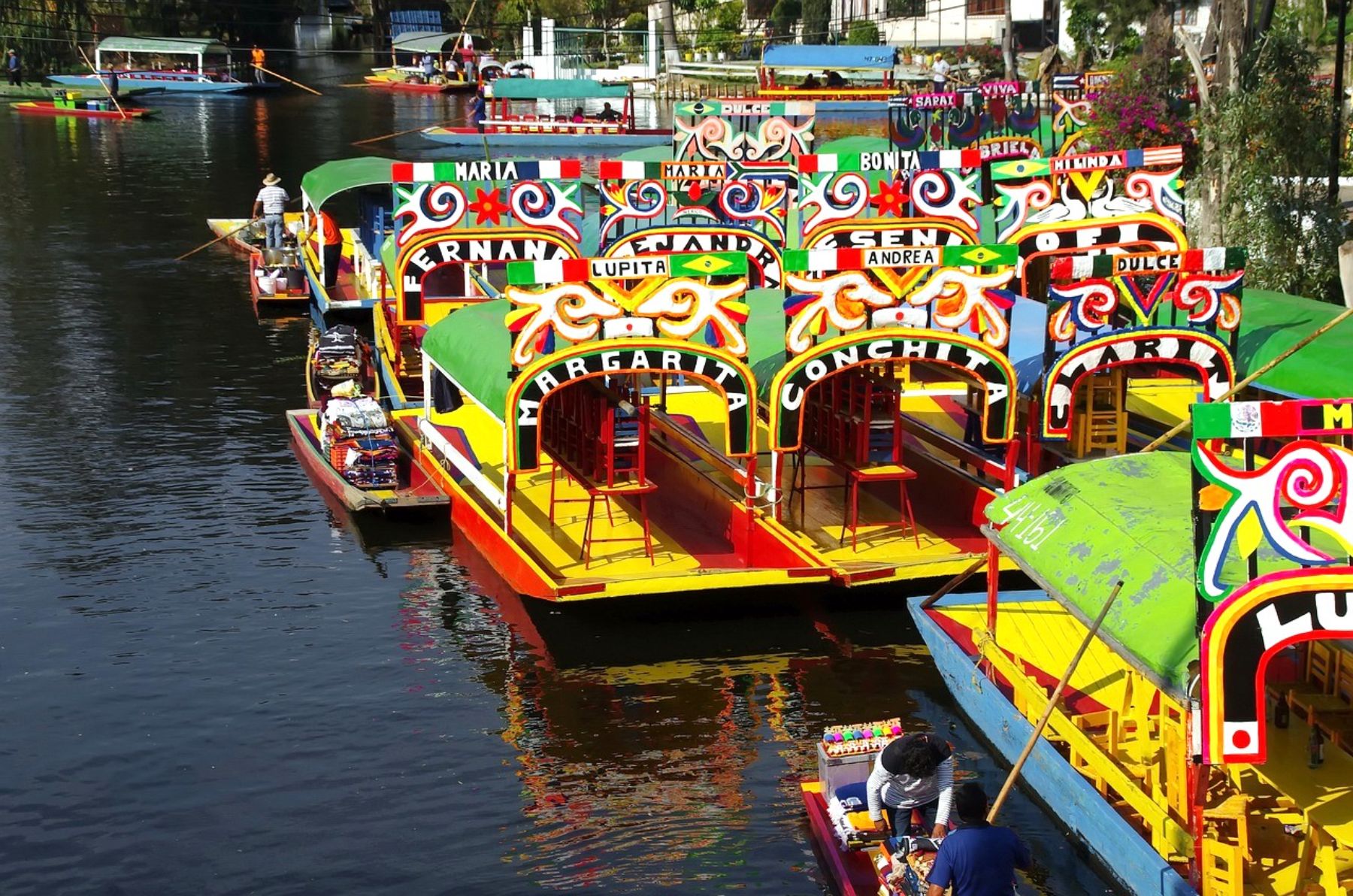 Colourful river boats at Xochimilco in Mexico