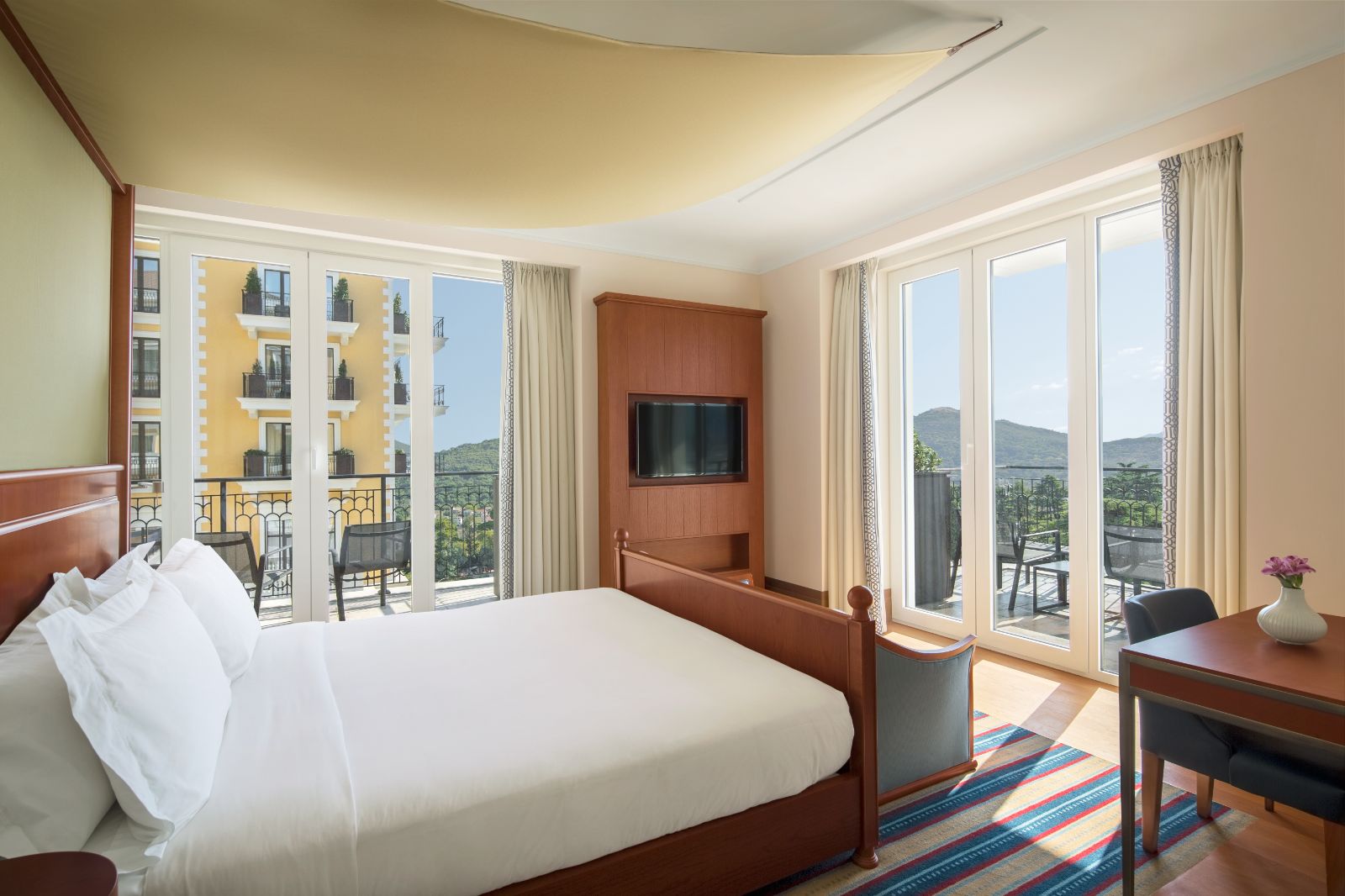 Venezia Wing guest suite with mountain views at Regent Porto Montenegro in the Boka Bay of Montenegro
