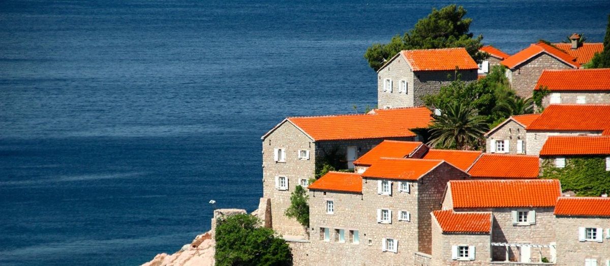 Grey stone houses on the Mediterranean coast of Montenegro